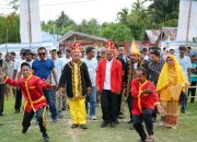 Disambut Adat Cakalele, Ketua KONI Sulteng Buka KONI Cup 2025 di Tomini